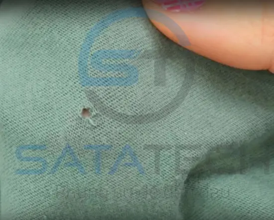 thủng vải sau khi gỡ tem từ cứng